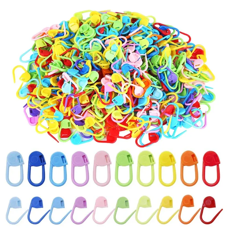Pile of 50 assorted color locking stitch markers with a row showing each color